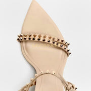 Talons cloutés nude 